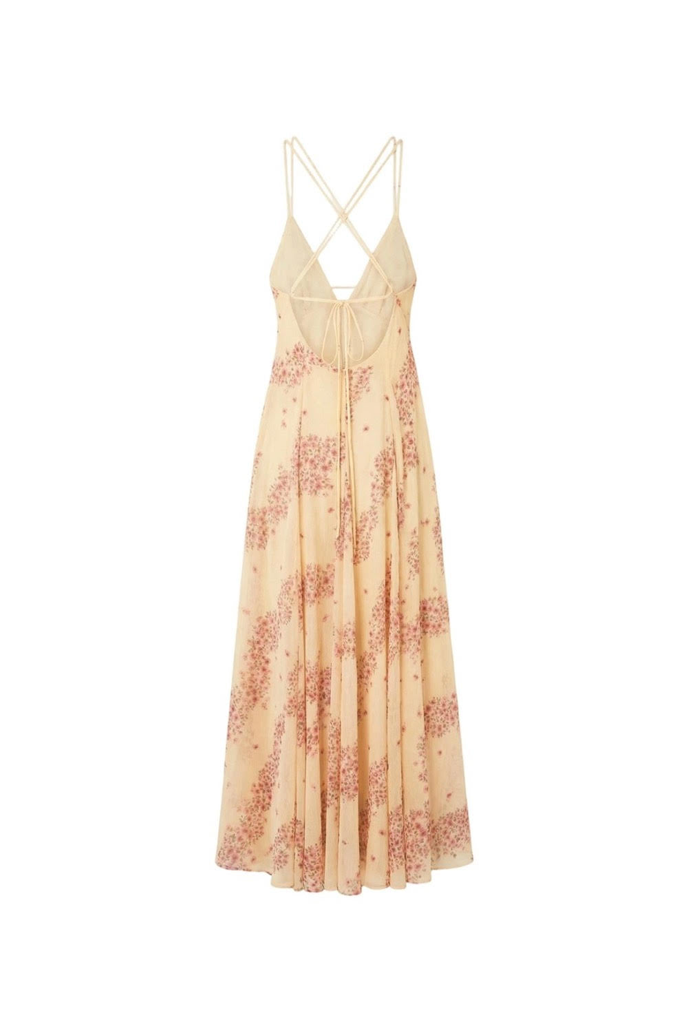 Robe dos nu fluide en mousseline beige et rose à imprimé d’inspiration asiatique par la marque parisienne Phème Paris, photographiée sur la côte du Sud de la France, idéale pour les vacances, les cérémonies d’été et les mariages de destination.