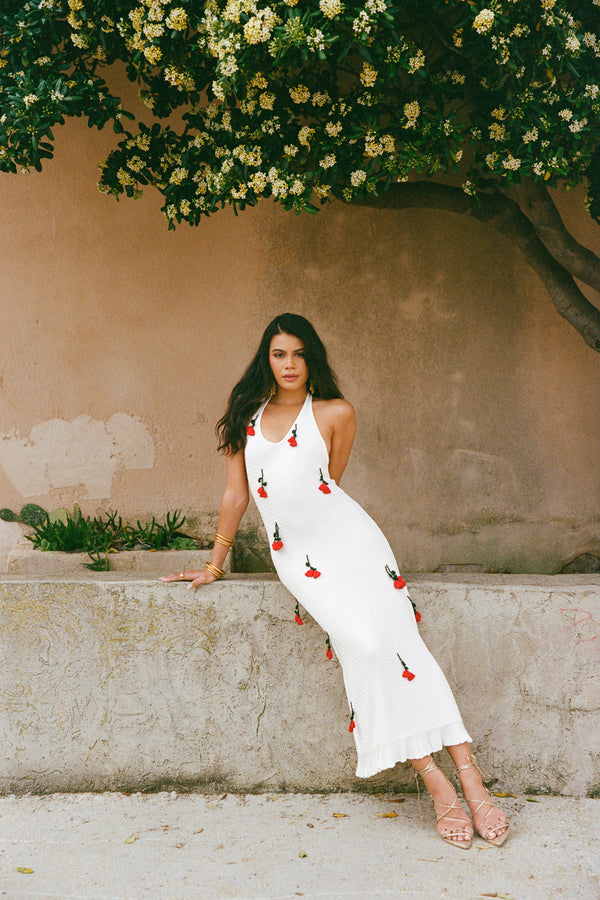Halterneck knit dress with crocheted flowers